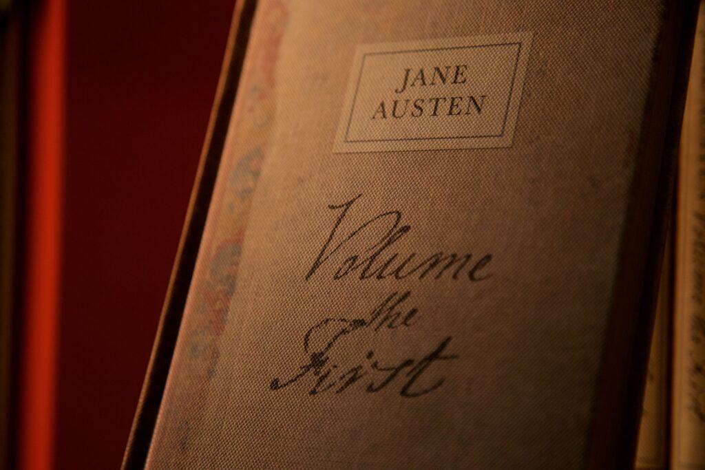 The cover of a Jane Austen book with the words "Volume the First" written on it.